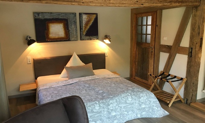 Schierstein House | Inviting Junior Suite with Private Bath and Balcony at Storchennest