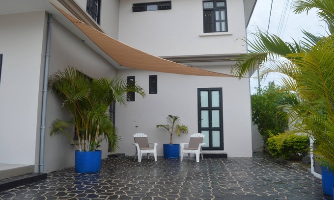 Pereybere Villa | Ideal Location: Steps from the Beach, Dining & Fun Amenities