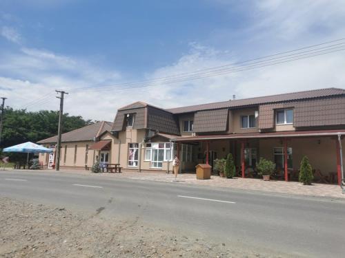 Dombrad Bed & Breakfast | Discover Kék Lagúna Panzió: Oceanfront Comfort Awaits