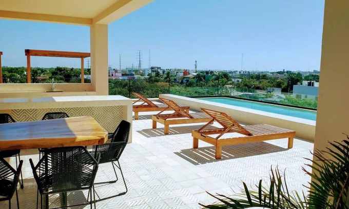 Ejidal Apartment | Top-Rated Kaab Atp: Cozy Apt with Rooftop Pool & More