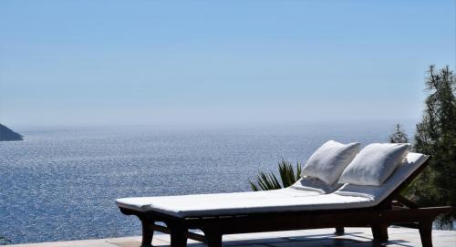 Faralya Cabin | Elegant Kabak Avalon Bungalows with Oceanfront Bliss