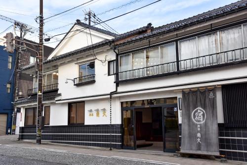 Takaoka Hotel | Relaxing Kadokyu Ryokan: Family-Friendly with Hot Tub Access
