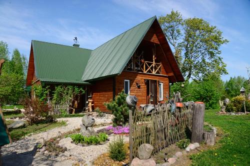 Anyksciai House | Discover Navyna: Oceanfront Retreat with Pool & Family Amenities