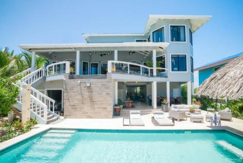 Placencia Villa | Discover Kairos Villa: Oceanfront Oasis with Private Pools