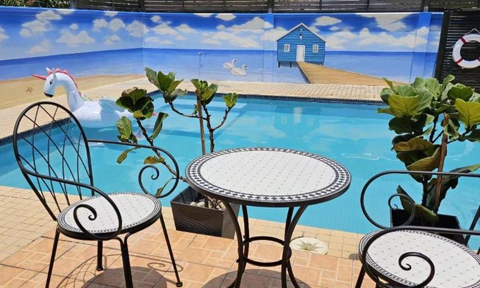 Taman Sri Reko Villa | Inviting Kajang Pool Party Villa with Oceanfront Views
