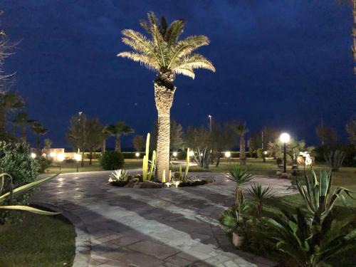 Municipio 1 Bed & Breakfast | Elegant Kalì B&B: 4-Star Stay with Pool and Pet-Friendly