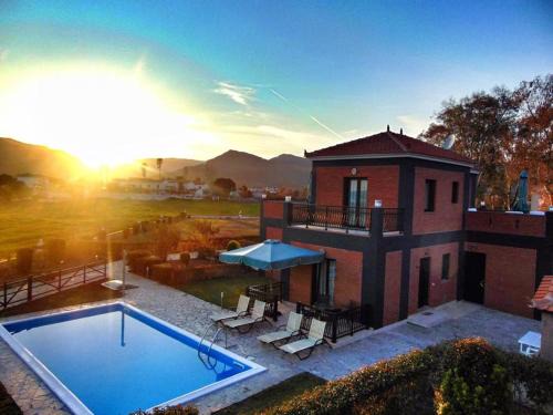Skala Kallonis Apartment | Relax at Kalloni Beach Villas with Ocean Views & Pool