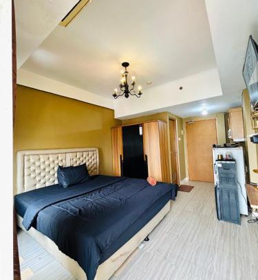Pondokcina Apartment | Discover Kamar Apartemen Harian: Poolside Comfort in Depok