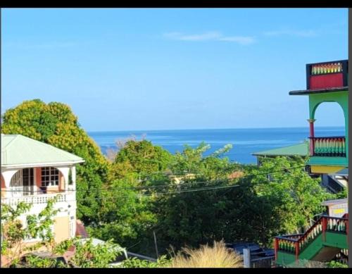 Pointe Michel Apartment | KanXio's Apartment: Family-Friendly Stay with Breakfast Included