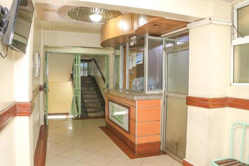 Central Business District Hotel | Cozy KAP Guest House with Breakfast & Child-Friendly Amenities