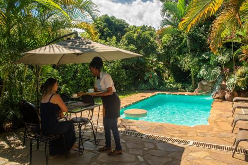 Entebbe House | Unwind at Karibu Entebbe: Oceanfront Bliss and Spa Retreat