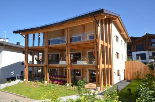 Kastelruth Apartment | Oceanfront Escape at Kastelart - Karbon with Spa & Hot Tub