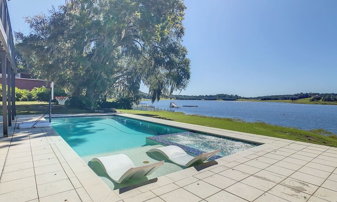 Dade City House | Dog-Friendly Lakehouse with Pool, Spa & Kayaks Await!