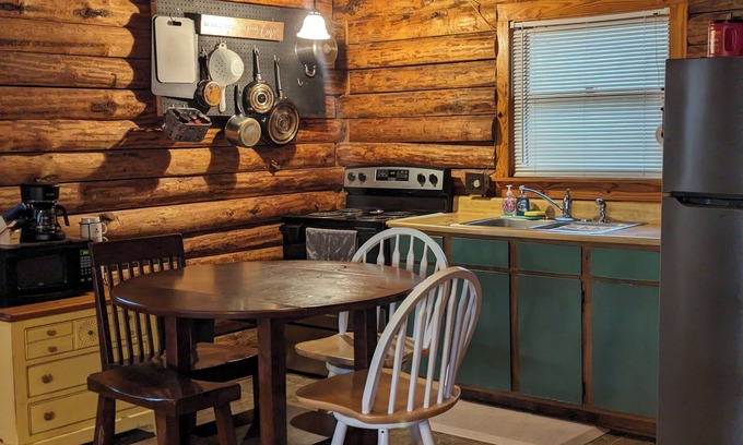 Kill Devil Hills Cabin | Top-Rated KDH Cozy Log Cabin with Ocean View & Spa