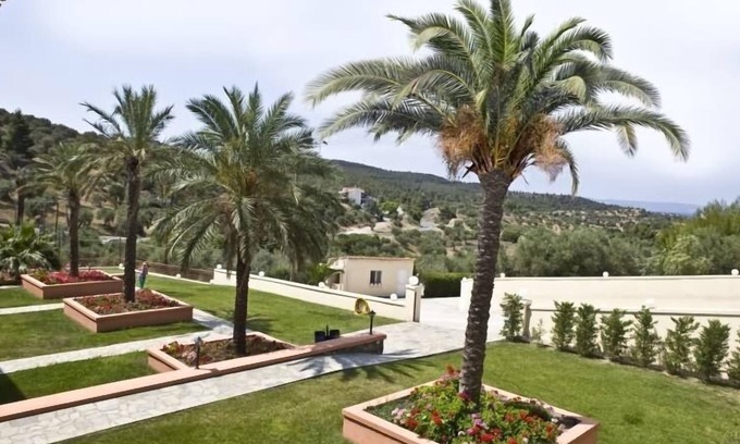 Neos Marmaras Hotel | Relaxing Kelyfos Hotel Bungalows with Ocean View & Spa