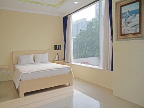 Bangka Hotel | Discover Kemang Eleven: Family-Friendly & Accessible Stay