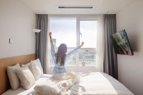 Moseulpo Hotel | Discover Kenny Stay Jeju Mosulpo: Family-Friendly Retreat