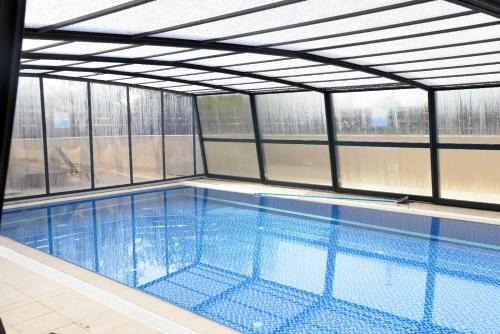Netiv HaShayara Cabin | Unforgettable Stay at Keren Or: Pool, Pet Friendly & More