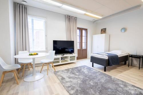 Varkaus Apartment | Elevate Your Stay at Keskusta Sviitti with Balcony & More