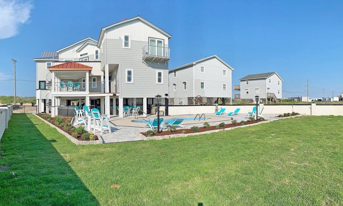 Kitty Hawk House | Experience Unmatched Comfort with Private Pool & Gym