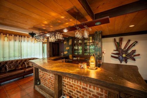 Nong Nam Daeng House | Discover Khao Yai Log House: Family-Friendly 4-Star Retreat