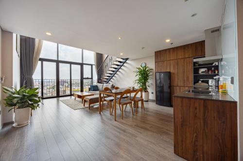Tay Ho Apartment | Elegant Duplex Apartment at PentStudio with Bridge Views