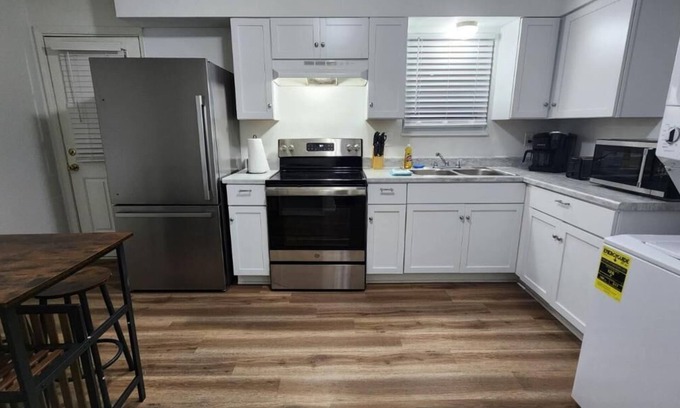 Buechel Apartment | Cozy 2BR Townhome: Pet Friendly, Parking & Breakfast Included
