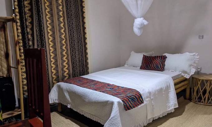 Ruhondo Apartment | KING ROOM located in Lake view and Volcanos view