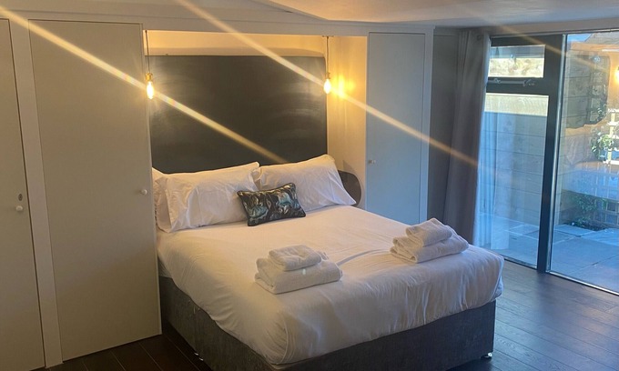 Clitheroe Apartment | Cozy King Bedroom with Private Bath and Family Amenities