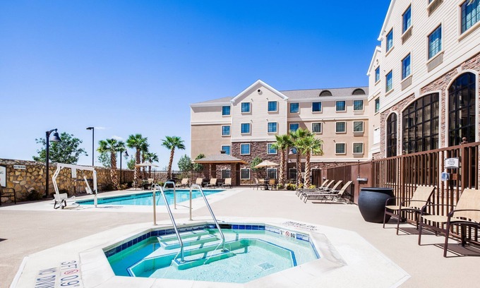 Biggs Field Apartment | King Studio with Free Breakfast & Pool Access Await You