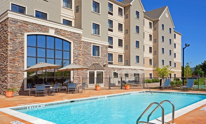 Concordville Condo | Enjoy the King Suite with Free Breakfast & Pool Access!