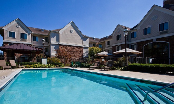 Utica Apartment | King Suite | Free Daily Breakfast, 24h Business Center + Seasonal Pool