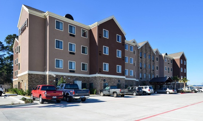Tomball Condo | Explore Our King Suite in Tomball with Pool & Fitness Center