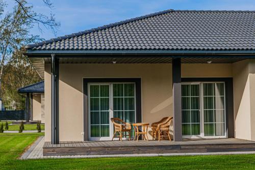 Kintai Villa | Discover Kintų Perlas: 4-Star Hotel with Hot Tub & Pet-Friendly
