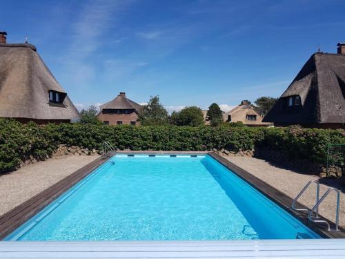 Wenningstedt-Braderup Apartment | Experience Kliffblick am Watt with Heated Pool & 10/10 Rating
