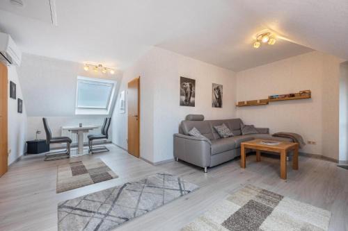Loehne Apartment | Comfortable Kastanie Apartment with Ocean Views & Balcony