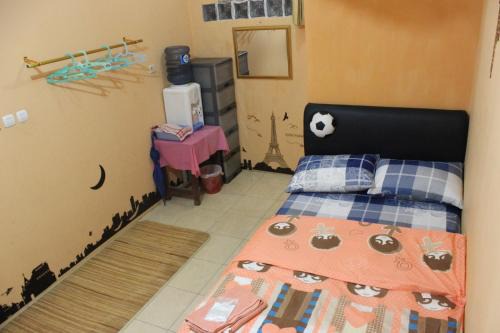Jakarta House | Top-Rated Kokas Room: Child-Friendly Comfort Awaits