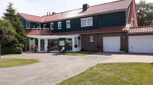 Utarp Apartment | Oceanfront Comfort: 4-Star Family Apartment in Ostfriesland