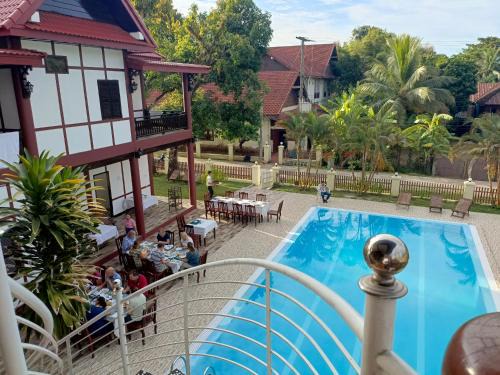 Muang Khong House | Discover Kongmany Colonial House with Private Pool & Breakfast