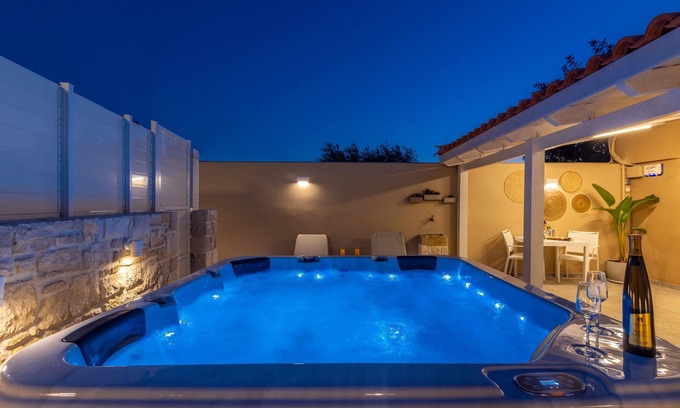 Koutsouras Apartment | Indulgent Konstantinos Suite with Hot Tub, Steps from Beach