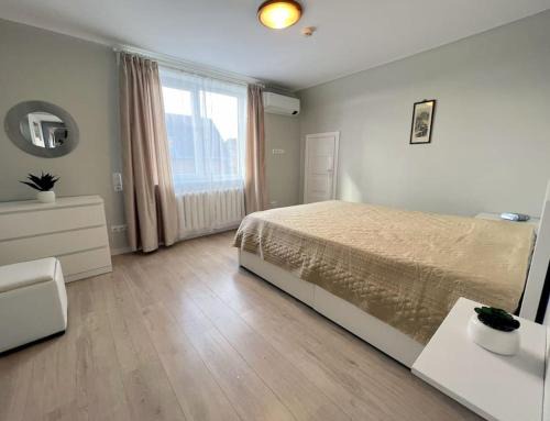Siauliai Apartment | Pet-Friendly Kotedžas nuomai - Retro 70, Šiauliai with Ocean View