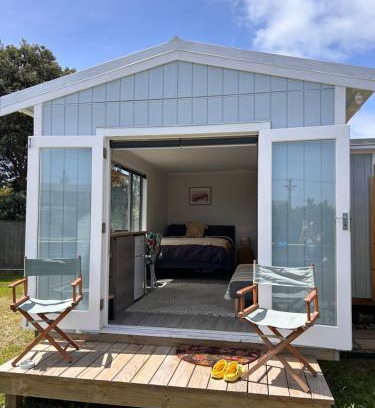 Otaki Beach House | Top-Rated Kowhai Landing Beach Cabin with Hot Tub Access