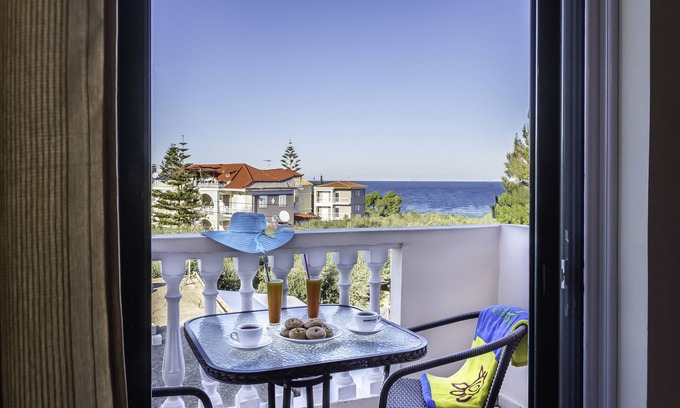 Amoudi Apartment | Relax at Kozanos II Studio: Pool & Beachside Bliss