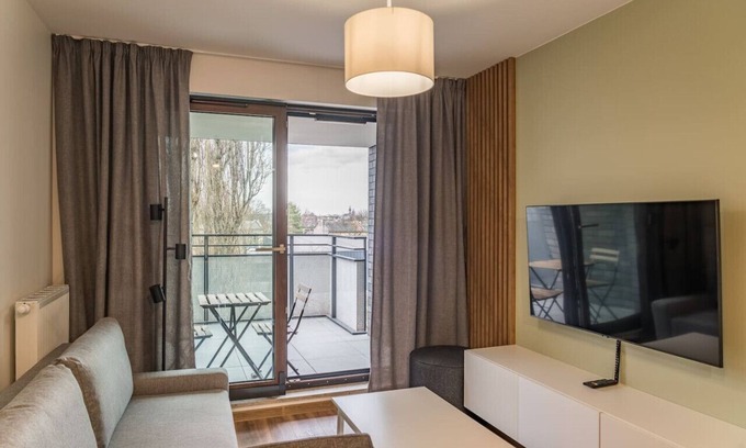 Krowodrza Apartment | Modern Kraków Business Suite with City View and Balcony