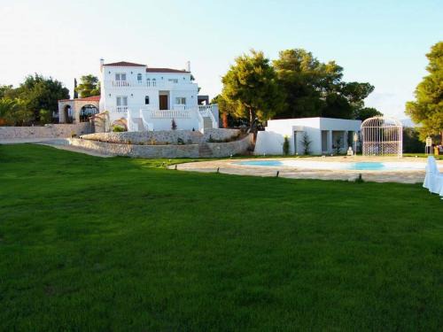 Agii Anargiri House | Experience Ktima Nafsika: Oceanfront Retreat with Pool