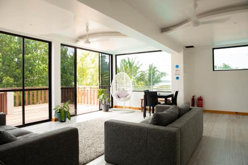 Thulusdhoo Island House | Idyllic Kudhi Boli Beach House with Oceanfront Views