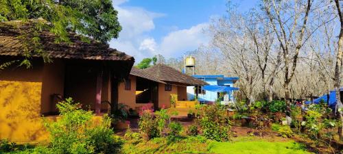 Hosdurg House | Pet-Friendly Kudil Mud Cottages with Breakfast in Cheemeni