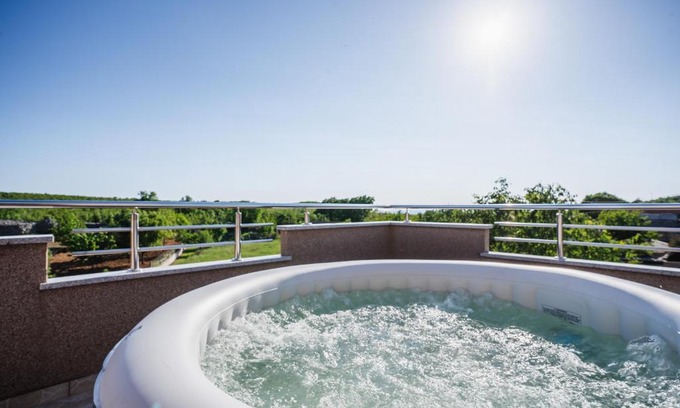 Unesic House | Discover Kulušić House: Family-Friendly with Hot Tub & Dining