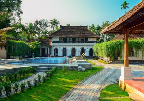Kumarakom Resort | Heritage Getaway at Kumarakom Tharavadu with Oceanfront Pool