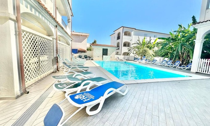 Orosei Apartment | Relaxing Apartment in Orosei with Scenic Pool View